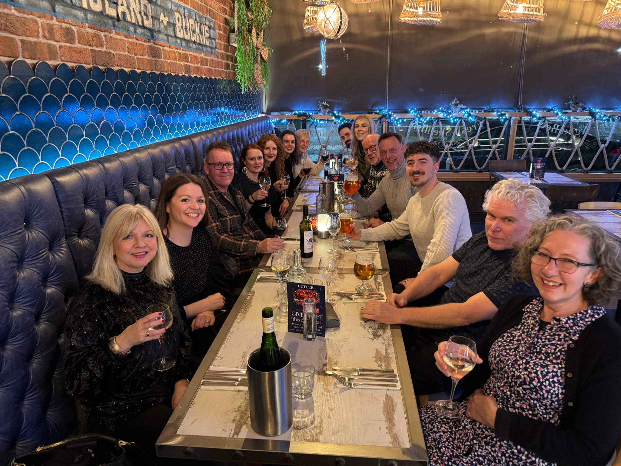 The Michael Band Fitness community enjoying a group meal together