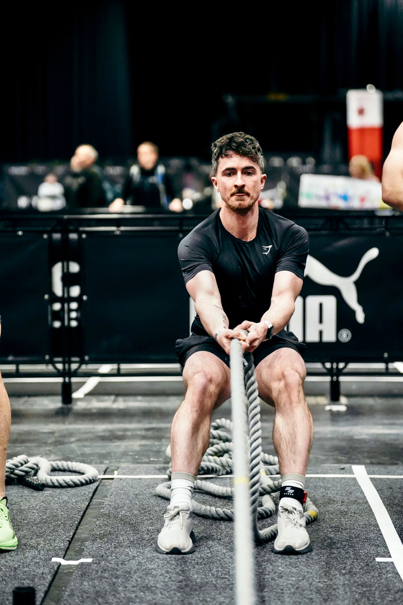 Michael taking on the sled pull at a HYROX event